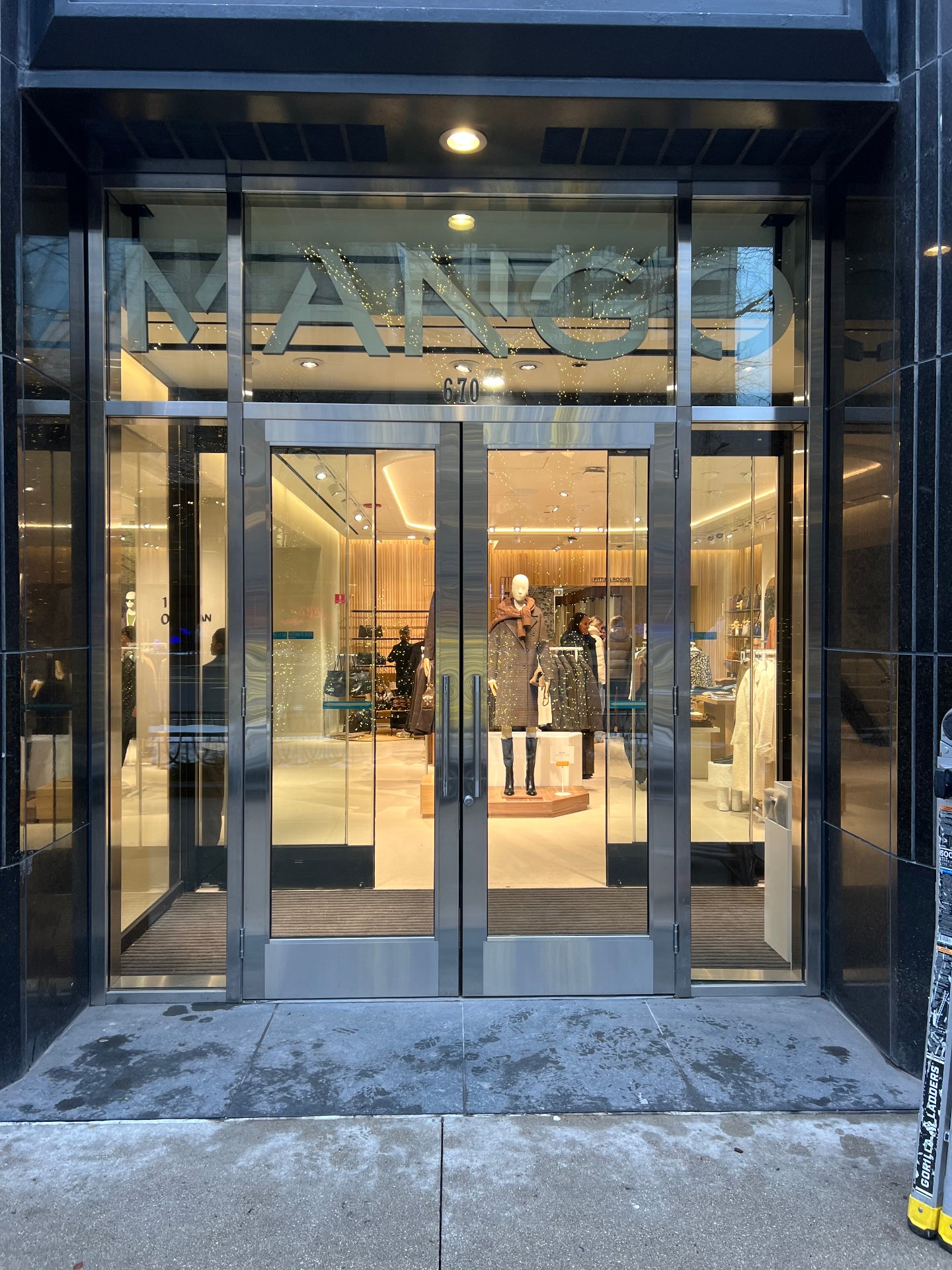 Kawneer aluminum storefront install — Mango by Chicago Glass Company